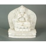 A Chinese alabaster seated buddha
