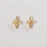 A pair of diamond and eighteen karat gold stud earrings