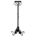 An Italian Spanish Revival style iron torchiere