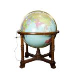 A Replogle 32" library globe on stand, illuminated, 50"h overall