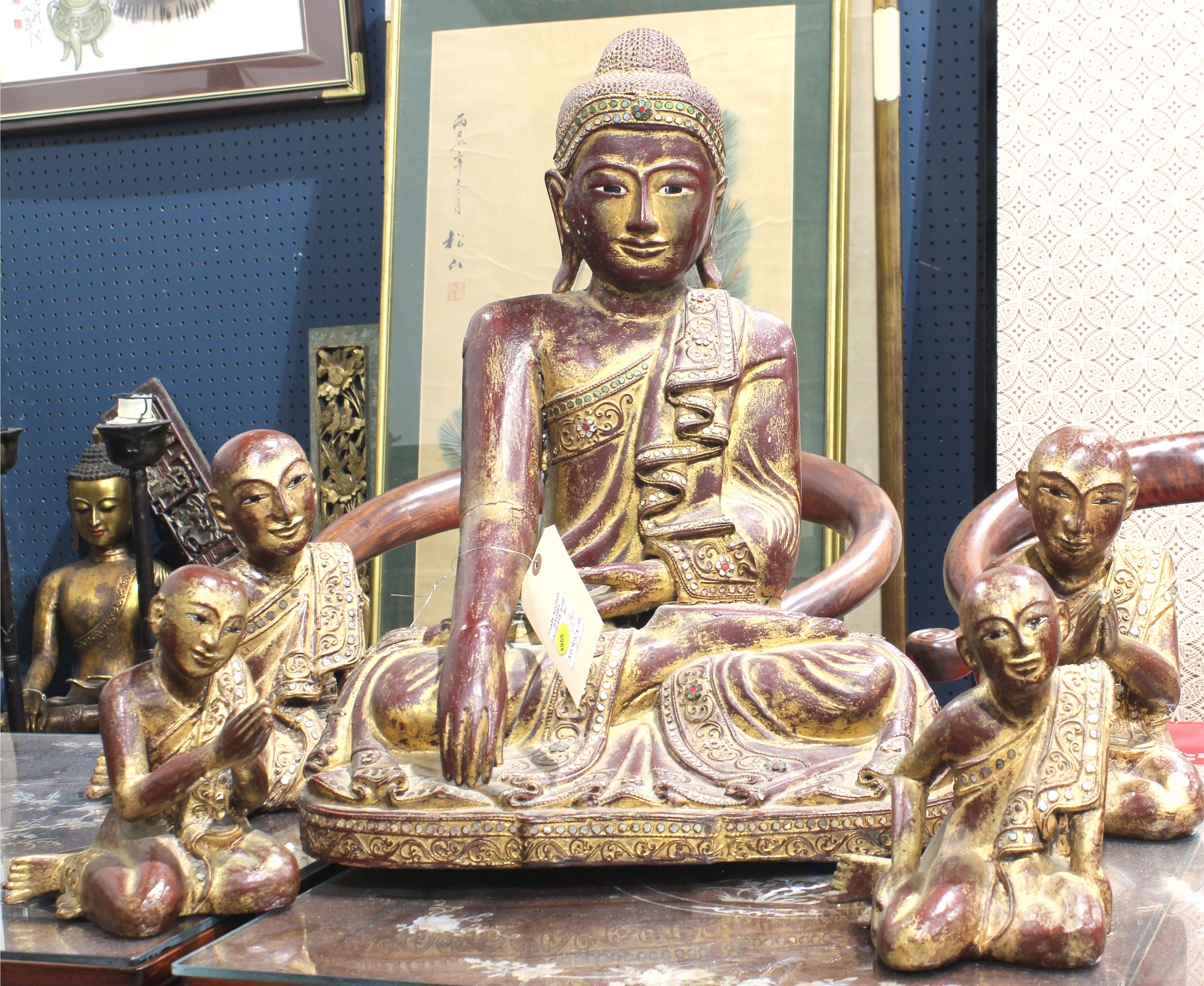 (lot of 5) Thai mirrored inlaid gilt over lacquer seated figure of Buddha