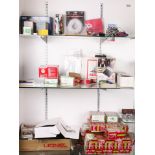 Three shelves of mainly LGB model train parts