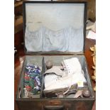 A pair of roller skates, in a hard suitcase