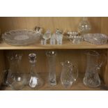 Two shelves of cut and frosted glasswares