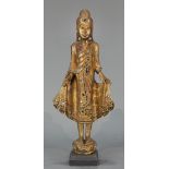 Thai inlaid gilt over lacquer standing figure of Buddha