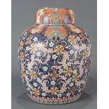 Chinese polychrome enameled covered jar with stylized flowers