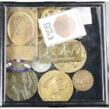 A case of medals including San Francisco Twin Bicentennial