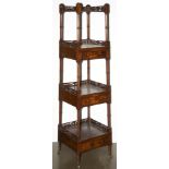 A Sheraton turned and fret carved mahogany four-tiered whatnot shelf