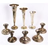 3 sterling weighted trumpet vases & 4 International candlestands