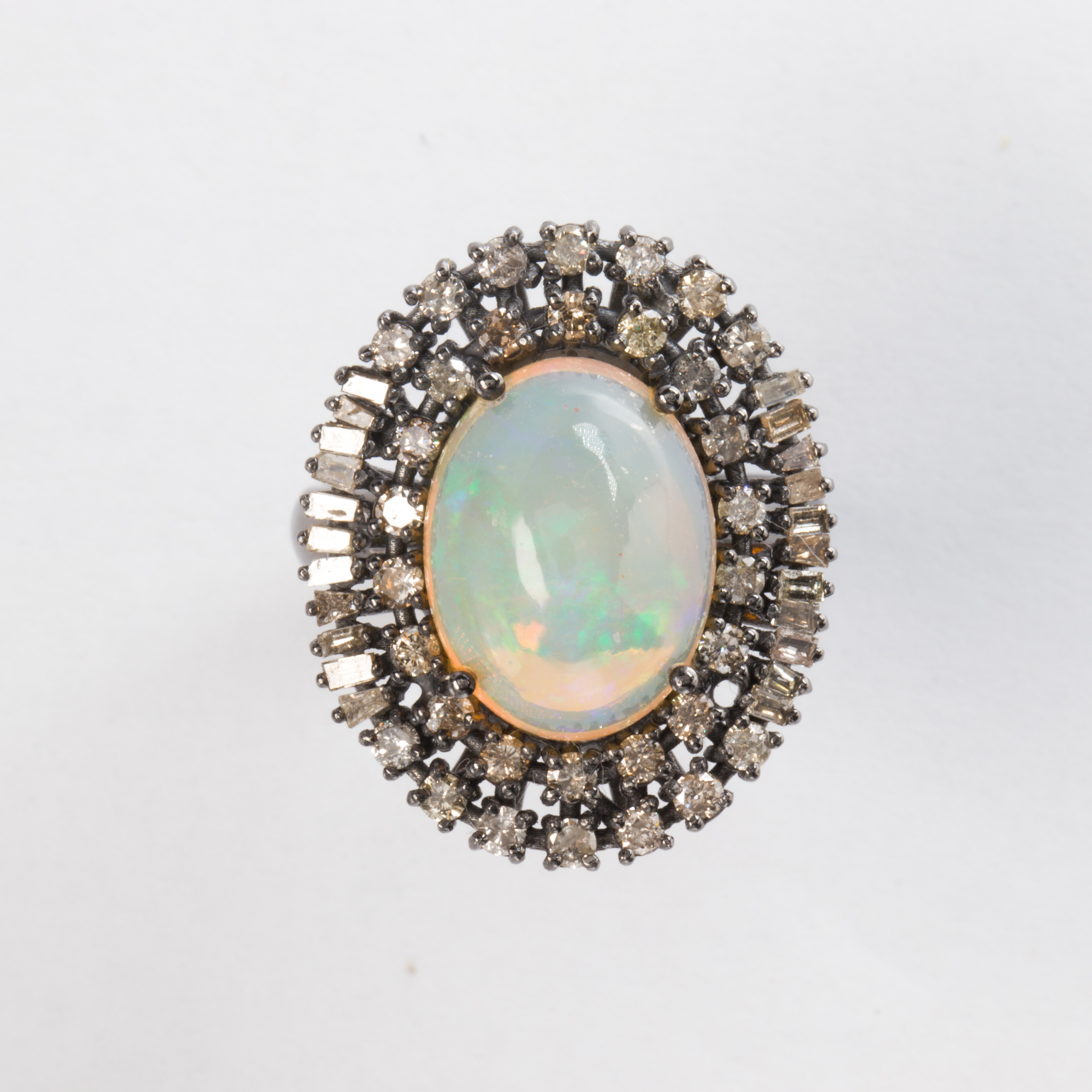 An opal, diamond and blackened sterling silver ring