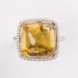 A citrine, diamond and eighteen karat gold ring