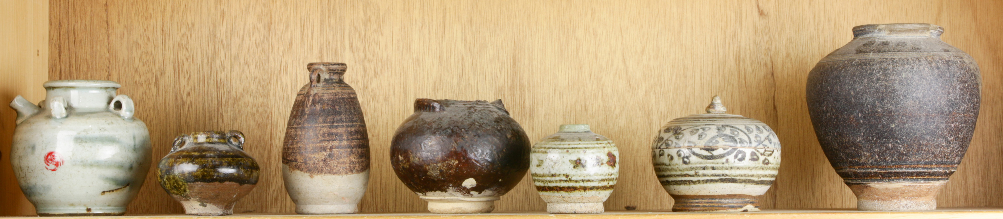 (6) Asian brown or blue/white trade jars and ewer