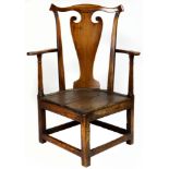A Georgian oak corner chair