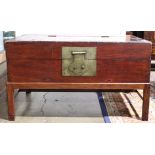 Chinese red lacquered hardwood chest on stand