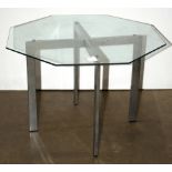 A modernist chrome coffee table