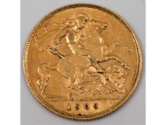 A 1909 Edwardian half gold sovereign