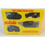 A four piece boxed & sealed Solido 1944-1984 comme