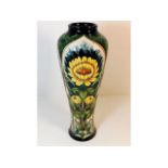 A large Moorcroft floral vase by Rachel Bishop wit