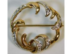 A 9ct gold brooch set with small diamonds 0.75in diameter, 2.6g