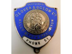 A vintage chrome & enamel badge of local interest