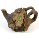 A Chinese stoneware teapot of organic form with cr