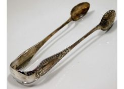 An 1876 pair of Scottish Glasgow silver sugar tong