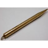 A 9ct gold cased pencil, approx. 21.5g. Provenance