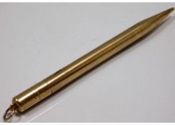 A 9ct gold cased pencil, approx. 21.5g. Provenance