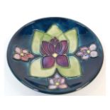 A floral Moorcroft pottery trinket dish, silver li