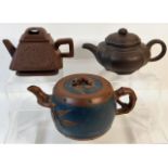 Three small Chinese Yixing teapots, largest 6.5in