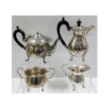 A 1919 four piece London silver tea set by Charles