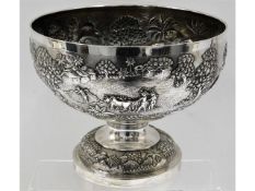 An impressive 19thC. repoussé silver monteith decorated with Asian rural scenes by Grish Chunder Dut