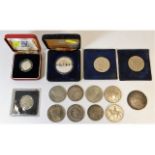 A quantity of coins & crowns including a silver 1880 dollar; a silver proof Barcelona Olympic Games