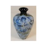 A Moorcroft blue geranium vase 6.25in tall with bo