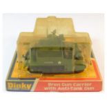 A boxed Dinky model Bren Gun Carrier with anti-tan