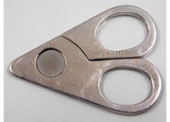 A pair of 0.830 silver cigar cutters, probably Dan