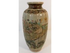 A Meiji period Japanese earthenware vase with enam