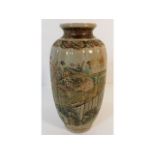 A Meiji period Japanese earthenware vase with enam