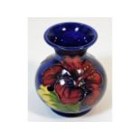 A floral Moorcroft pottery vase 3.75in tall