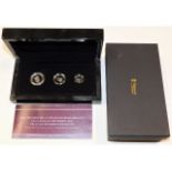 A Hattons of London boxed three coin 22ct white go