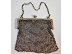 A silver mesh purse inscribed "From the wives of t