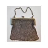 A silver mesh purse inscribed "From the wives of t