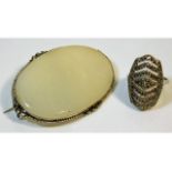 A 1930's white agate brooch twinned with a silver art deco marcasite ring size O/P, both with faults