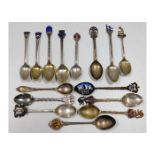 Eight silver collectable type teaspoons approx. 85