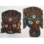 Two c.1900 Tibetan Ganesh masks decorated with cor