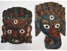 Two c.1900 Tibetan Ganesh masks decorated with cor