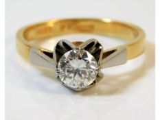 An 18ct gold ring set with a lively diamond of good clarity approx. 0.7ct 3.4g, size L