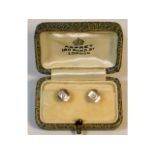 A pair of 18ct gold & platinum collar studs set wi