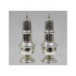 A pair of small 1915 Chester silver sugar sifters