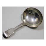 An 1842 London silver caddy spoon by Charles Lias,